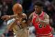 CHICAGO, IL - MARCH 05: Jimmy Butler #21 of the Chicago Bulls fouls Dwight Howard #12 of the Houston Rockets at the United Center on March 5, 2016 in Chicago, Illinois. The Bulls defeated the Rockets 108-100. NOTE TO USER: User expressly acknowledges and