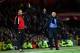 MANCHESTER, ENGLAND - OCTOBER 26: Chelsea Manager Jose Mourinho (R) protests during the Barclays Premier League match between Manchester United and Chelsea at Old Trafford on October 26, 2014 in Manchester, England. (Photo by Laurence Griffiths/Getty I