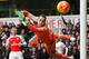 Arsenal's Colombian goalkeeper David Ospina (R) dives but cannot stop the shot from Tottenham Hotspur's English striker Harry Kane (not pictured) as Tottenham take a 2-1 lead during the English Premier League football match between Tottenham Hotspur and A