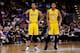 MILWAUKEE, WI - FEBRUARY 22: D'Angelo Russell #1 of the Los Angeles Lakers and Jordan Clarkson #6 watch Kobe Bryant shoot a free throw during the game against the Milwaukee Bucks at BMO Harris Bradley Center on February 22, 2016 in Milwaukee, Wisconsin. N