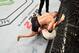 Diaz works below as McGregor tries to maintain side control.