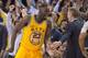 March 1, 2016; Oakland, CA, USA; Golden State Warriors forward Draymond Green (23) is congratulated by head coach Steve Kerr (right) after making a three-point basket against the Atlanta Hawks during overtime at Oracle Arena. The Warriors defeated the Haw