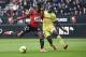 Rennes' French forward Ousmane Dembele (L) vies for the ball with Nantes' French defender Youssouf Sabaly during the French L1 football match between Rennes (SRFC) and Nantes (FCN) on March 6, 2016 at the Roazhon Park stadium in Rennes, western France. A