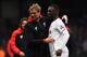 LONDON, ENGLAND - MARCH 06: Jurgen Klopp manager of Liverpool celebrates victory with winning goalscorer Christian Benteke of Liverpool after the Barclays Premier League match between Crystal Palace and Liverpool at Selhurst Park on March 6, 2016 in Lond