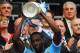 LONDON, ENGLAND - MAY 14: Yaya Toure of Manchester City celebrates with the trophy after his sides victory during the FA Cup sponsored by E.ON Final match between Manchester City and Stoke City at Wembley Stadium on May 14, 2011 in London, England. (Pho