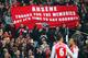 WEST BROMWICH, ENGLAND - NOVEMBER 29: (EDITORS NOTE: This is a retransmission of image #459708260 with an alternative crop) Arsenal fans hold up a banner for Arsene Wenger, manager of Arsenal during the Barclays Premier League match between West Bromw