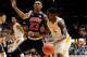 Mar 9, 2016; Nashville, TN, USA; Tennessee Volunteers forward Armani Moore (4) drives the ball against Auburn Tigers guard TJ Lang (23) during game one of the SEC Tournament at Bridgestone Arena. Mandatory Credit: Joshua Lindsey-USA TODAY Sports