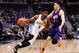 Mar 10, 2016; Denver, CO, USA; Phoenix Suns guard Devin Booker (1) guards Denver Nuggets guard Emmanuel Mudiay (0) in the second quarter at the Pepsi Center. Mandatory Credit: Isaiah J. Downing-USA TODAY Sports