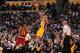 LOS ANGELES, CA - MARCH 10: Kobe Bryant #24 of the Los Angeles Lakers shoots the ball during the game against LeBron James #23 of the Cleveland Cavaliers on March 10, 2016 at STAPLES Center in Los Angeles, California. NOTE TO USER: User expressly acknowle