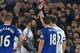 Chelsea's Brazilian-born Spanish striker Diego Costa (C) is shown a red card by referee Michael Oliver during the English FA cup quarter-final football match between Everton and Chelsea at Goodison Park in Liverpool, north west England on March 12, 2016.