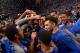 NASHVILLE, TN - MARCH 13: Jamal Murray #23 of the Kentucky Wildcats celebrates with teammates after an 82-77 overtime victory over the Texas A&M Aggies to win the SEC Basketball Tournament Championship at Bridgestone Arena on March 13, 2016 in Nashville,