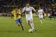 Real Madrid's Welsh forward Gareth Bale (R) vies with Las Palmas' midfielder Juan Carlos Valeron during the Spanish league football match UD Las Palmas vs Real Madrid CF at the Gran Canaria stadium in Las Palmas de Gran Canaria on March 13, 2016. / AFP /
