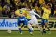 Real Madrid's Croatian midfielder Luka Modric (C) vies Las Palmas' midfielder Roque Mesa Quevedo (L) and Las Palmas' forward Jonathan Vieraduring the Spanish league football match UD Las Palmas vs Real Madrid CF at the Gran Canaria stadium in Las Palmas d