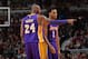 CHICAGO, IL - FEBRUARY 21: Kobe Bryant #24 of the Los Angeles Lakers gives direction to his teammate D'Angelo Russell #1 against the Chicago Bulls on February 21, 2016 at the United Center in Chicago, Illinois. NOTE TO USER: User expressly acknowledges a