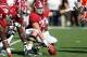 TUSCALOOSA, AL - SEPTEMBER 20: Ryan Kelly #70 of the Alabama Crimson Tide looks over the defense before a play against the Florida Gators during the game at Bryant-Denny Stadium on September 20, 2014 in Tuscaloosa, Alabama. Alabama defeated Florida 42-21.