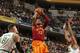 INDIANAPOLIS, IN - MARCH 15: Paul George #13 of the Indiana Pacers shoots against the Boston Celtics on March 15, 2016 at Bankers Life Fieldhouse in Indianapolis, Indiana. NOTE TO USER: User expressly acknowledges and agrees that, by downloading and or u
