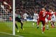 MUNICH, GERMANY - MARCH 16: Robert Lewandowski of Bayern Muenchen scores his team's second goal against goalkeeper Gianluigi Buffon during the UEFA Champions League round of 16 second leg match between FC Bayern Muenchen and Juventus Turin at Allianz Are