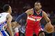 Mar 17, 2016; Philadelphia, PA, USA; Washington Wizards guard John Wall (2) dribbles against Philadelphia 76ers guard Ish Smith (1) during the first quarter at Wells Fargo Center. Mandatory Credit: Bill Streicher-USA TODAY Sports