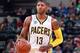 Mar 17, 2016; Indianapolis, IN, USA; Indiana Pacers forward Paul George (13) brings the ball up court against the Toronto Raptors at Bankers Life Fieldhouse. Mandatory Credit: Brian Spurlock-USA TODAY Sports