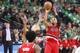 Mar 17, 2016; San Antonio, TX, USA; Portland Trail Blazers point guard Damian Lillard (0) shoots the ball over San Antonio Spurs point guard Tony Parker (9, left) during the second half at AT&T Center. Mandatory Credit: Soobum Im-USA TODAY Sports