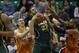 Mar 17, 2016; Salt Lake City, UT, USA; Utah Jazz center Rudy Gobert (27) grabs a rebound against Phoenix Suns center Alex Len (21) and center Tyson Chandler (4) in the first quarter at Vivint Smart Home Arena. Mandatory Credit: Jeff Swinger-USA TODAY Spor