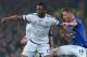 Chelsea's Nigerian midfielder John Obi Mikel (L) vies with Everton's Scottish-born Irish midfielder James McCarthy during the English FA cup quarter-final football match between Everton and Chelsea at Goodison Park in Liverpool, north west England on Marc
