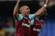 LIVERPOOL, ENGLAND - MARCH 05: Dimitri Payet (L) of West Ham United celebrates the win after the Barclays Premier League match between Everton and West Ham United at Goodison Park on March 5, 2016 in Liverpool, England. (Photo by Gareth Copley/Getty Ima