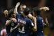 Paris Saint-Germain's Uruguayan forward Edinson Cavani (R) is congratulated by teammates after scoring his second goal during the French L1 football match Monaco (ASM) vs Paris Saint-Germain (PSG), on August 30, 2015 at the Louis II stadium in Monaco. AFP