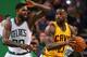 BOSTON, MA - DECEMBER 15: Amir Johnson #90 of the Boston Celtics defends LeBron James #23 of the Cleveland Cavaliers during the third quarter at TD Garden on December 15, 2015 in Boston, Massachusetts. NOTE TO USER: User expressly acknowledges and agrees