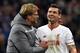 Liverpool's German manager Jurgen Klopp (L) and Liverpool's Croatian defender Dejan Lovren celebrate their victory over FC Rubin Kazan after the UEFA Europa League group B football match between FC Rubin Kazan and Liverpool FC in Kazan on November 5, 2015