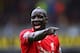 WATFORD, ENGLAND - DECEMBER 20: Mamadou Sakho of Liverpool gives instructions during the Barclays Premier League match between Watford and Liverpool at Vicarage Road on December 20, 2015 in Watford, England. (Photo by Ian Walton/Getty Images)