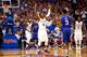 LAWRENCE, KS - JANUARY 30: Devonte' Graham #4 of the Kansas Jayhawks energizes the crowd during the 1st half of the game against the Kentucky Wildcats at Allen Fieldhouse on January 30, 2016 in Lawrence, Kansas. (Photo by Jamie Squire/Getty Images)