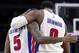 Mar 25, 2016; Auburn Hills, MI, USA; Detroit Pistons center Andre Drummond (0) hugs guard Kentavious Caldwell-Pope (5) after a play during the second quarter against the Charlotte Hornets at The Palace of Auburn Hills. Mandatory Credit: Raj Mehta-USA TODA