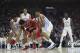 PHILADELPHIA, PA - MARCH 25: Isaiah Hicks #4 of the North Carolina Tar Heels and Juwan Morgan #13 of the Indiana Hoosiers fight for the ball as Nate Britt #0 of the North Carolina Tar Heels looks on during the 2016 NCAA Men's Basketball Tournament East R