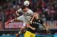 Cologne's defender Jonas Hector (L) vies Dortmund's defender Matthias Ginter during the German first division Bundesliga football match 1 FC Cologne vs Borussia Dortmund in Cologne, western Germany, on December 19, 2015.
/ AFP / PATRIK STOLLARZ / RESTR