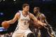 Mar 26, 2016; Brooklyn, NY, USA; Brooklyn Nets center Brook Lopez (11) drives against Indiana Pacers center Ian Mahinmi (28) during the third quarter at Barclays Center. Brooklyn Nets won 120-110. Mandatory Credit: Anthony Gruppuso-USA TODAY Sports