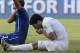 Uruguay forward Luis Suarez (R) puts his hand to his mouth after clashing with Italy's defender Giorgio Chiellini during a Group D football match between Italy and Uruguay at the Dunas Arena in Natal during the 2014 FIFA World Cup on June 24, 2014. Urugua