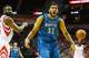 HOUSTON, TX - MARCH 18: Karl-Anthony Towns #32 of the Minnesota Timberwolves reacts to a call in front of James Harden #13 of the Houston Rockets on the court during their game at the Toyota Center on March 18, 2016 in Houston, Texas. NOTE TO USER: User