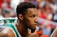 ATLANTA, GA - APRIL 19: Evan Turner #11 of the Boston Celtics reacts on the bench in the final minutes of their 89-72 loss to the Atlanta Hawks in Game Two of the Eastern Conference Quarterfinals during the 2016 NBA Playoffs at Philips Arena on April 19,