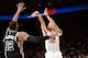 OAKLAND, CA - APRIL 7: Stephen Curry #30 of the Golden State Warriors shoots against the San Antonio Spurs during the game on April 7, 2016 at ORACLE Arena in Oakland, California. NOTE TO USER: User expressly acknowledges and agrees that, by downloading