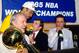 Jerry Buss celebrating the Lakers' 1985 NBA title with Kareem Abdul-Jabbar (being interviewed by Brent Musburger) and Pat Riley.