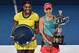 Serena Williams and Angelique Kerber during the trophy ceremony at 2016 Australian Open.