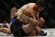 Jul 30, 2016; Atlanta, GA, USA; Matt Brown (red gloves) competes against Jake Ellenberger (blue gloves) during UFC 201 at Phillips Arena. Mandatory Credit: Butch Dill-USA TODAY Sports