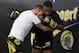 Punk spars with a teammate in the gym.