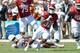 DALLAS, TX - OCTOBER 8: Running back Samaje Perine #32 of the Oklahoma Sooners runs through an attempted tackle from safety Jason Hall #31 of the Texas Longhorns on October 8, 2016 at The Cotton Bowl in Dallas, Texas. (Photo by Jackson Laizure/Getty Image