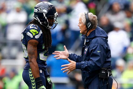 SEATTLE, WA - OCTOBER 16:  Coach Pete Carroll of the Seattle Seahawks speaks with cornerback Richard Sherman #25 against the Atlanta Falcons at CenturyLink Field on October 16, 2016 in Seattle, Washington.  (Photo by Otto Greule Jr/Getty Images)