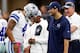 ARLINGTON, TX - OCTOBER 09: (L-R) Dak Prescott #4, quarterback of the Dallas Cowboys talks with injured quarterback Tony Romo #8 prior to the game against the Cincinnati Bengals at AT&T Stadium on October 9, 2016 in Arlington, Texas. (Photo by Wesley Hi