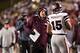 FAYETTEVILLE, AR - NOVEMBER 21: Head Coach Dan Mullen talks with Dak Prescott #15 of the Mississippi State Bulldogs on the sidelines during a game against the Arkansas Razorbacks at Razorback Stadium Stadium on November 21, 2015 in Fayetteville, Arkansas