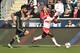 Oct 23, 2016; Philadelphia, PA, USA; New York Red Bulls forward Bradley Wright-Phillips (99) runs past Philadelphia Union defender Ken Tribbett (4) during the first half at Talen Energy Stadium. Mandatory Credit: Derik Hamilton-USA TODAY Sports