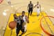 OAKLAND, CA - OCTOBER 25: Jonathon Simmons #17 of the San Antonio Spurs drives to the basket against Kevon Looney #5 of the Golden State Warriors on October 25, 2016 at ORACLE Arena in Oakland, California. NOTE TO USER: User expressly acknowledges and ag